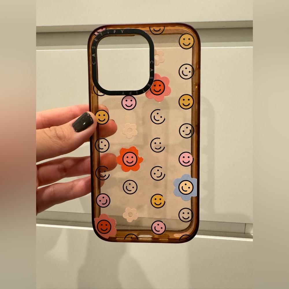 Casetify iPhone 13pro Impact Case
“Flower Smiles”
Clear Peach